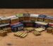 Assorted ammunition on a wooden table highlighting bulk packs and build quality