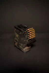 Black Multicam 200 round nutsack loaded with linked M855 5.56